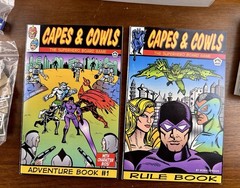 Capes & Cowls: The Superhero Board Game Adventures in Wyrd City Ultra Super Rare
