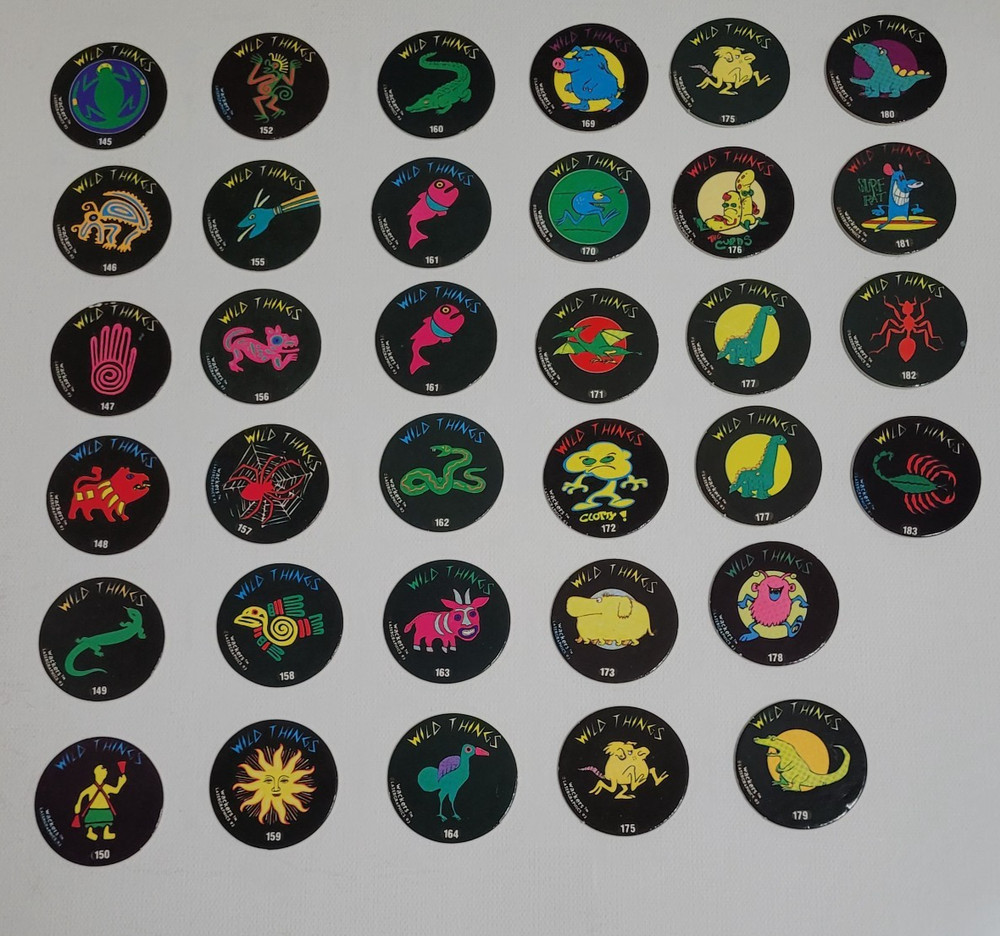 WILD THINGS POGS LOT OF 34 #s include misc 140’s, 150’s, 160’s, 170’s, 180’s
