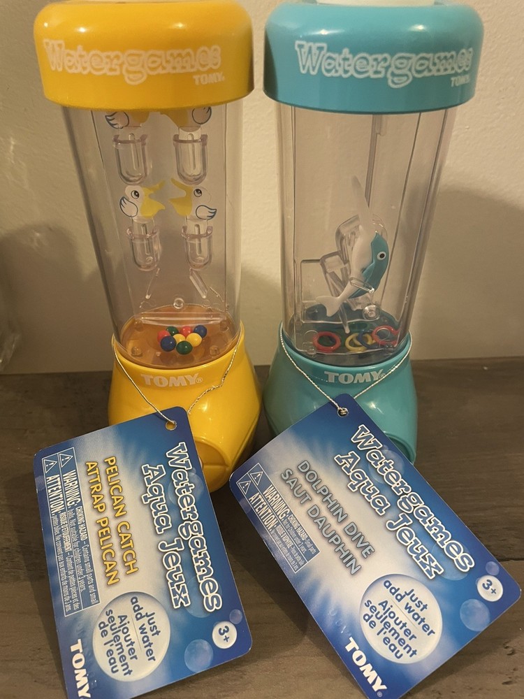 TOMY Water Games — Dolphin Ring Toss and Pelican Ball Basket Catch Toys – NEW