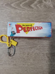 Perfection The Game Keychain 2000 FUN Milton Bradley Mini A Few Pieces Missing