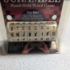 Word Spin Scramble 1995 Hand Held Word Game by Geospace 1 or More Players NEW