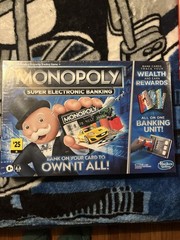 Hasbro Gaming Monopoly Super Electronic Banking Board Game w/ Unit 3 available