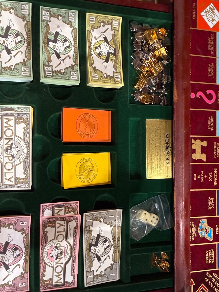 Original classic wooden monopoly board. Has all pieces and all money
