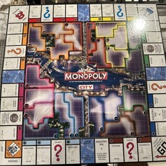 MONOPOLY CITY Metal TIN Box Edition Game 2009 New in Box. Never Played