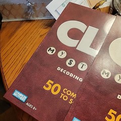 2005 CLUE Mysteries Decoding Detective Board Game New Sealed Box w/Outer Sleeve