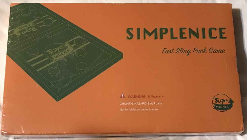 SIMPLENICE FAST SLING PUCK GAME/ NEW /SEALED/AGES 6 AND UP