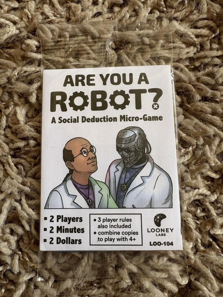 Are You a Robot? A Social Deduction Micro-Game 2-3 Players By Looney Labs